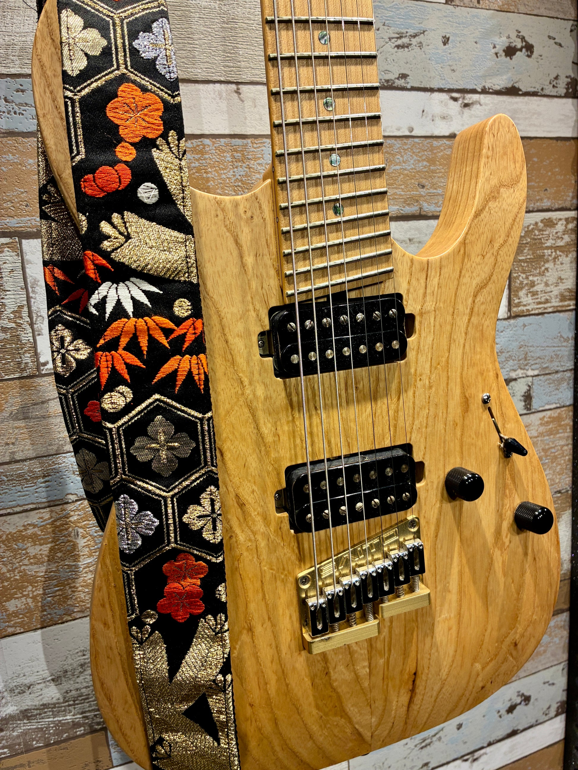 Hanakikko No.01A — Kimono Obi Guitar Strap, full view of the strap showing the flower and geometric weave.