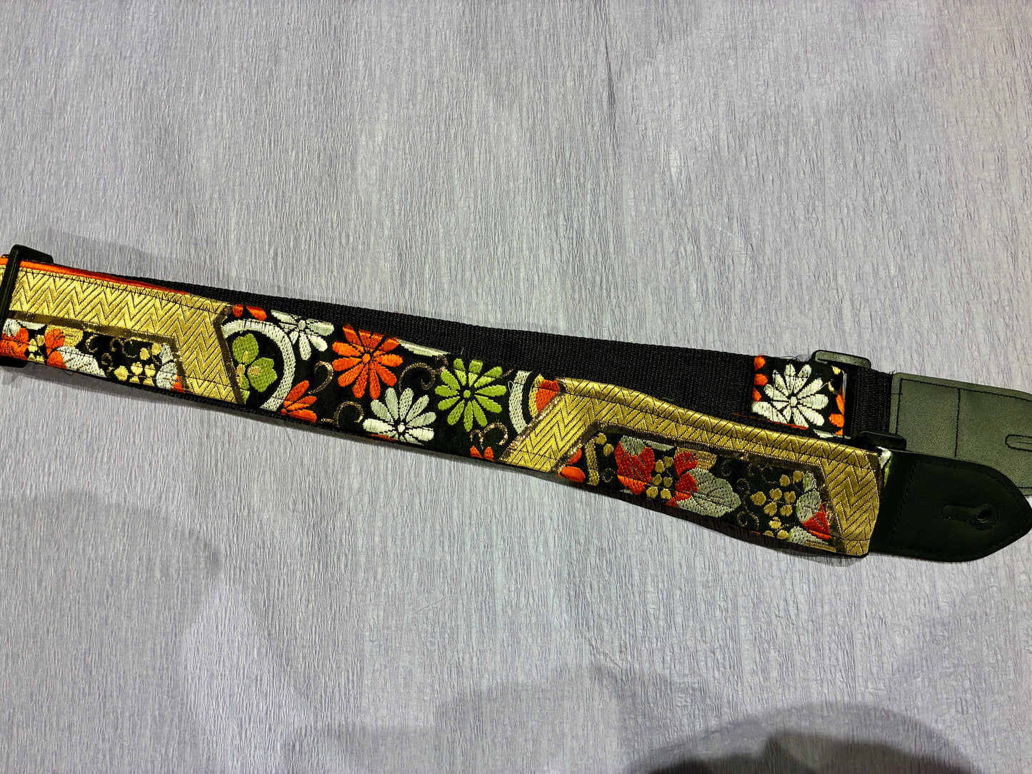 Kiku No.01A — Kimono Obi Guitar Strap, full view of the strap showing the chrysanthemum motif.
