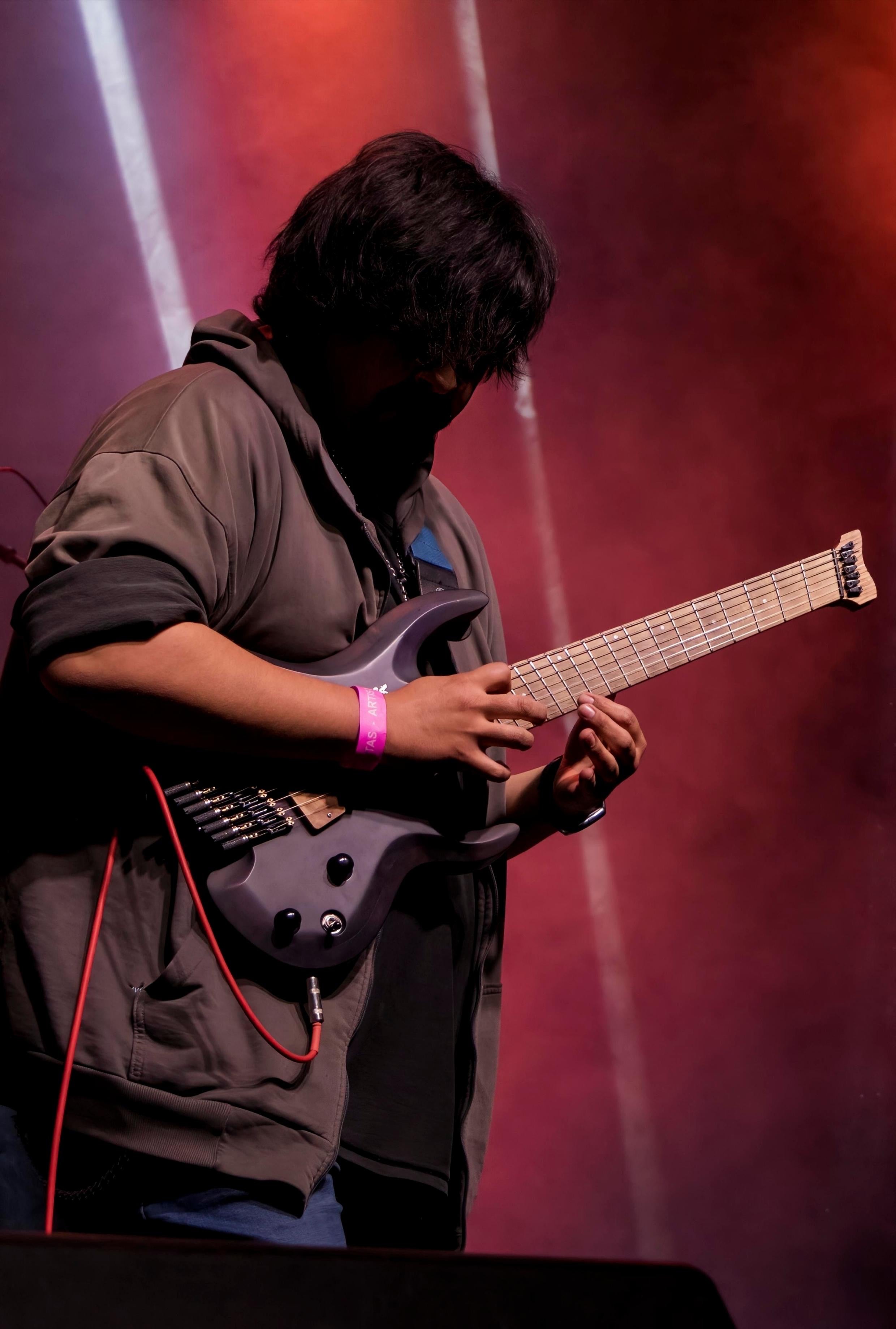 YitanPro performing a tapping passage on stage